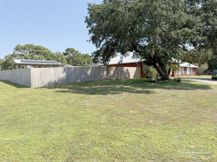 Property Photo:  6844 Perch St  FL 32566 
