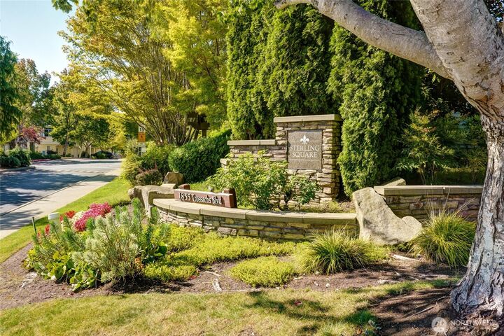 Property Photo: 1855 Trossachs Boulevard SE 1703 WA 98075