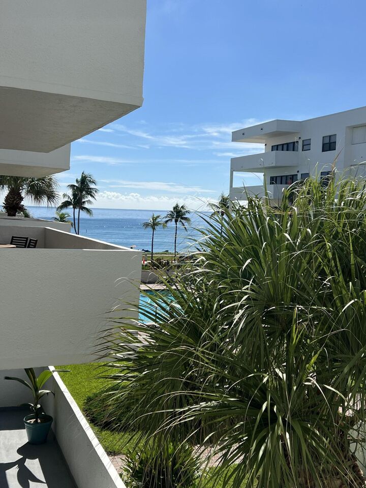 Property Photo:  330 SE 20th Avenue 315  FL 33441 