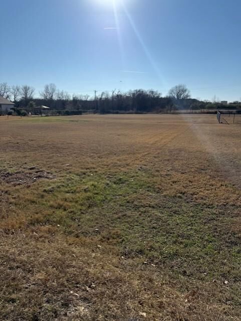 Property Photo:  221 Maverick Court  TX 76049 