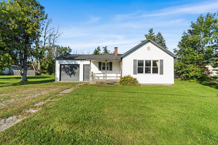 Property Photo:  1018 W First Street  MI 49721 