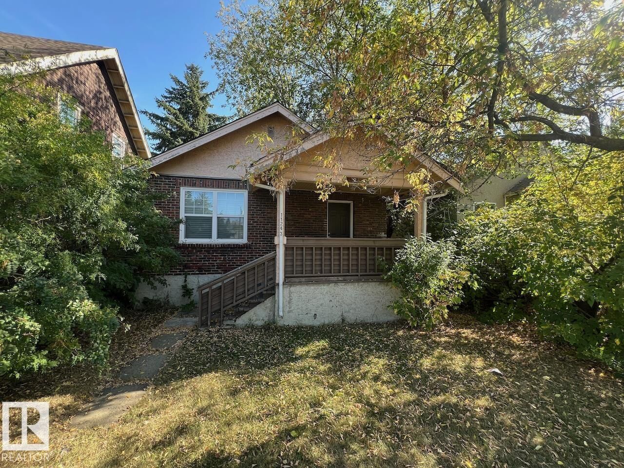 Property Photo:  11243 86 Street NW  AB T5B 3H7 