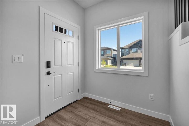 Property Photo:  215 Ravine Drive  AB T9G 0M2 