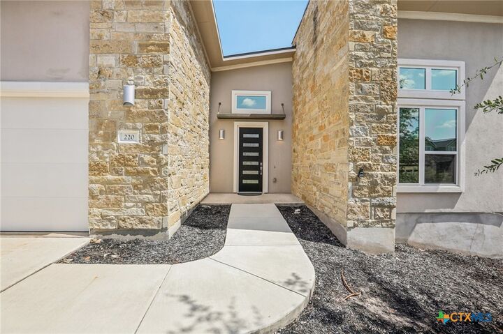 Property Photo:  220 Leaping Holly Street  TX 78666 