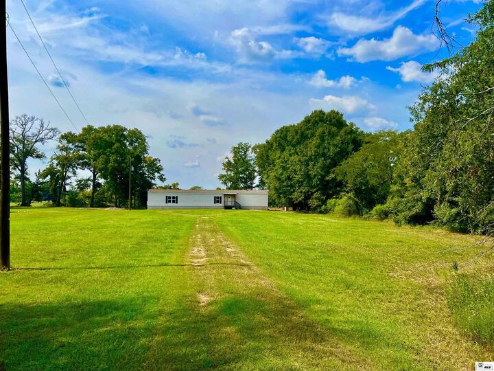 Property Photo: 2042 Highway 561 LA 71418