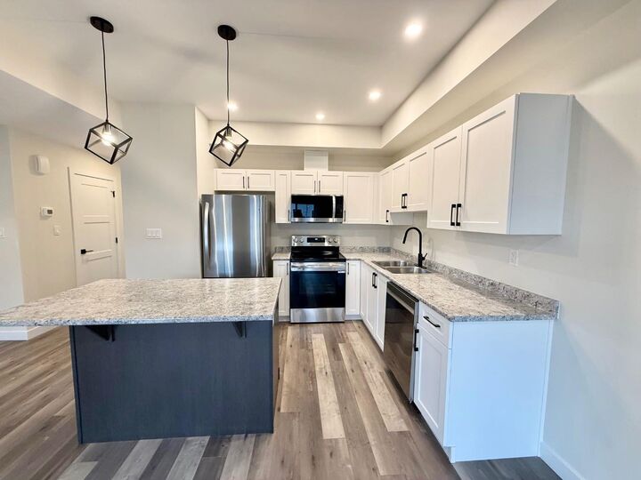 Property Photo:  328A Boutin Avenue  AB T7V 0B4 