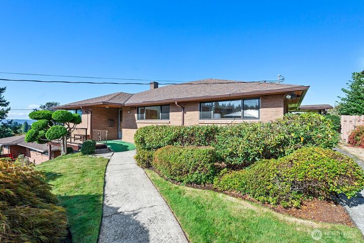 Property Photo:  8877  42nd Avenue SW  WA 98136 