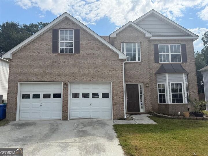 Property Photo:  7035 Red Maple Lane  GA 30058 
