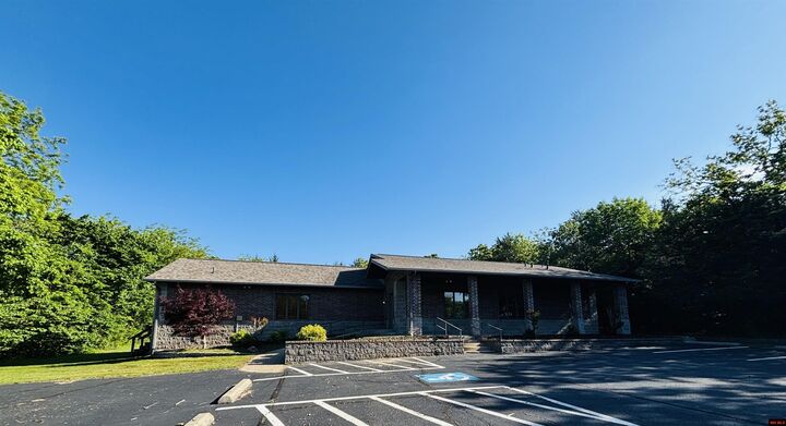 Property Photo:  1629 Harding Boulevard  AR 72626 