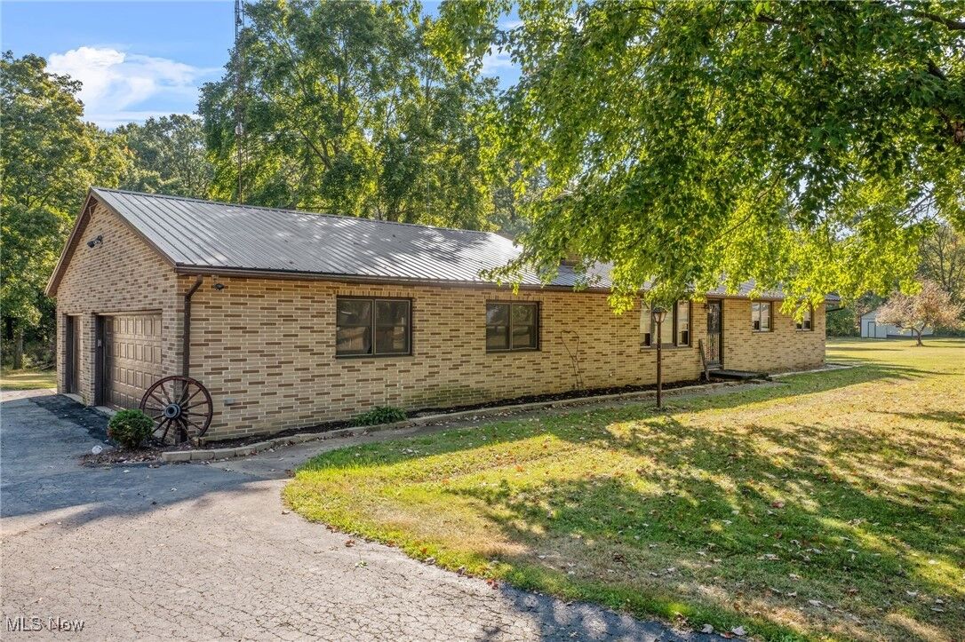 Property Photo:  10575 Burbank Road  OH 44214