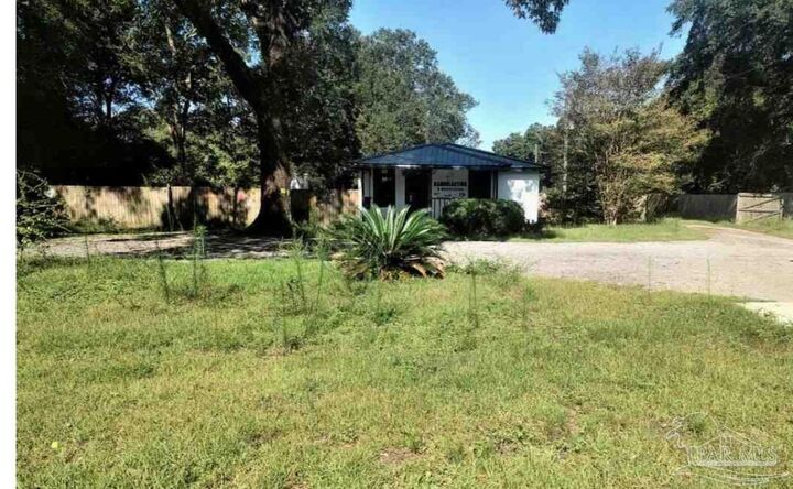 Property Photo:  10121 Chemstrand Rd  FL 32514 