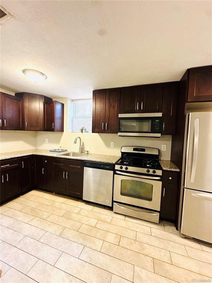 Property Photo:  1400 S Clermont Street 8  CO 80222 