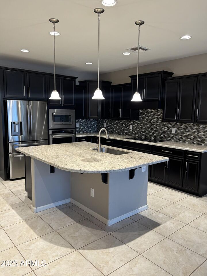 Property Photo: 8978 W Orchid Lane AZ 85345