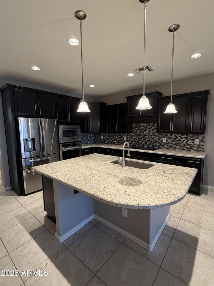 Property Photo:  8978 W Orchid Lane  AZ 85345 