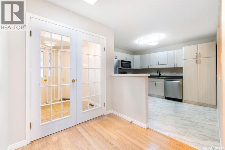 Property Photo:  8 3415 Calder Crescent  SK S7J 4Z9 