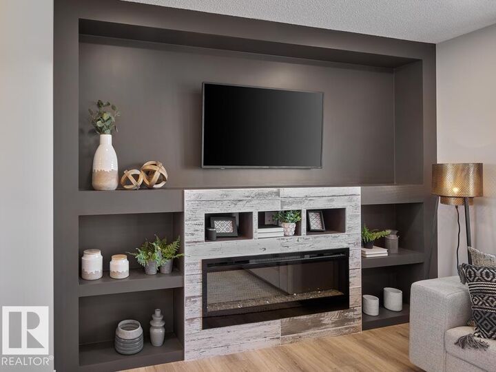 Property Photo:  1025 Secord Promenade NW 84  AB T5T 4A4 