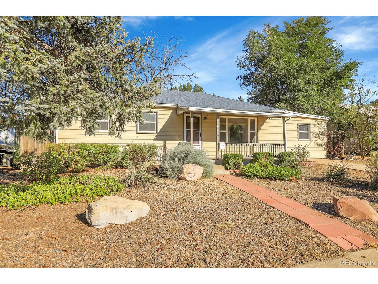 Property Photo:  720 Iola St  CO 80010 