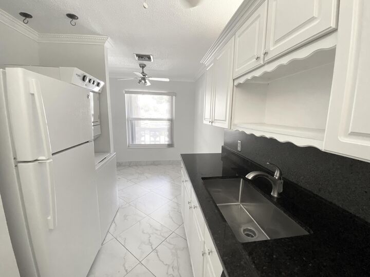 Property Photo:  2480 Juniper Drive 204  FL 33445 