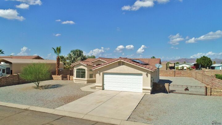 Property Photo: 13672 E 55 Ln AZ 85367