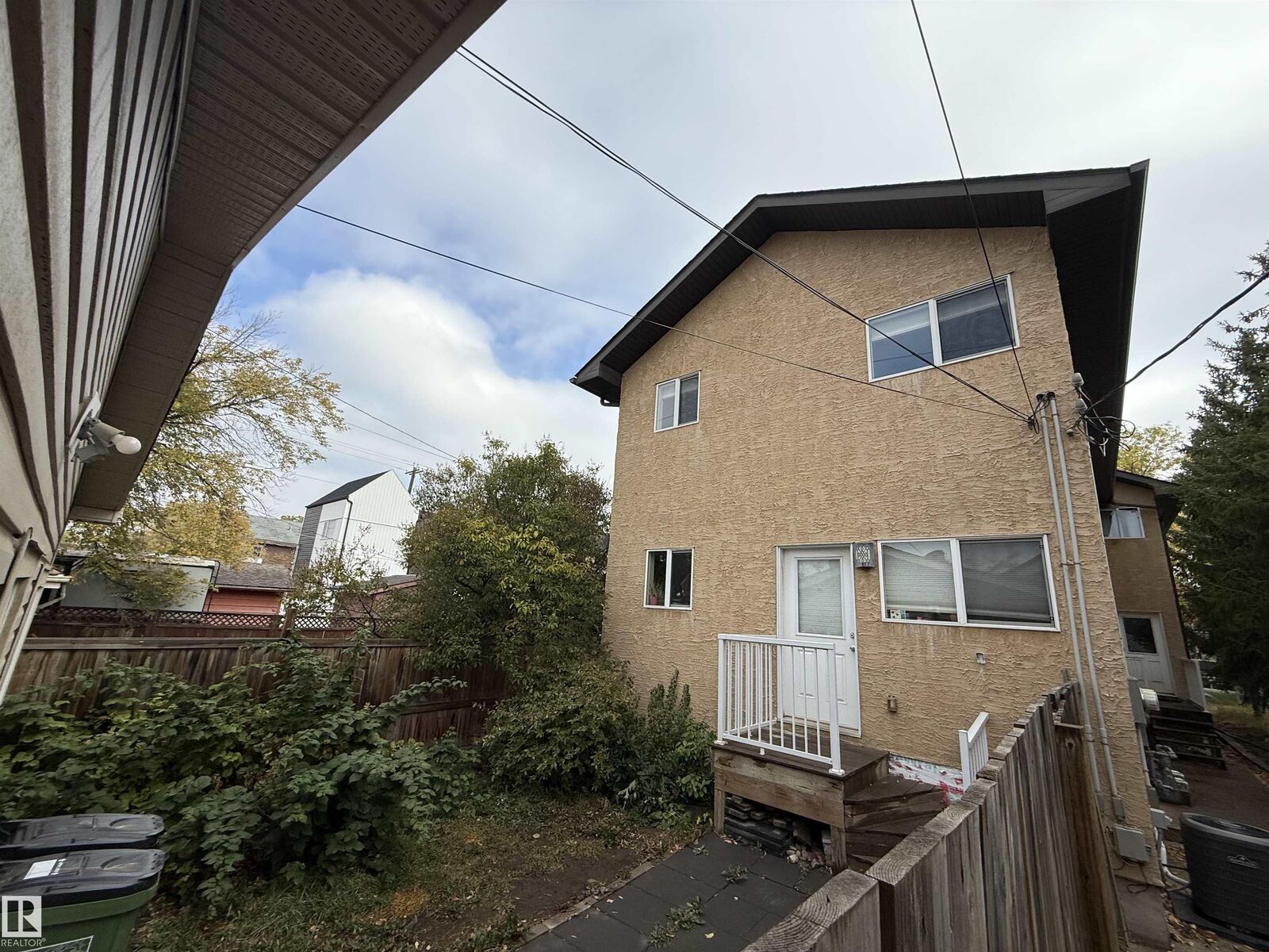 Property Photo:  11438 97 Street NW  AB T5G 1X5 