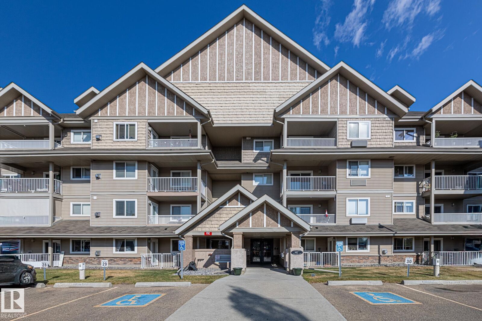 Property Photo:  6 Spruce Ridge Drive 106B  AB T7X 4P4 