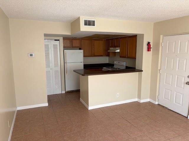 Property Photo:  728 Executive Center Dr  FL 33401