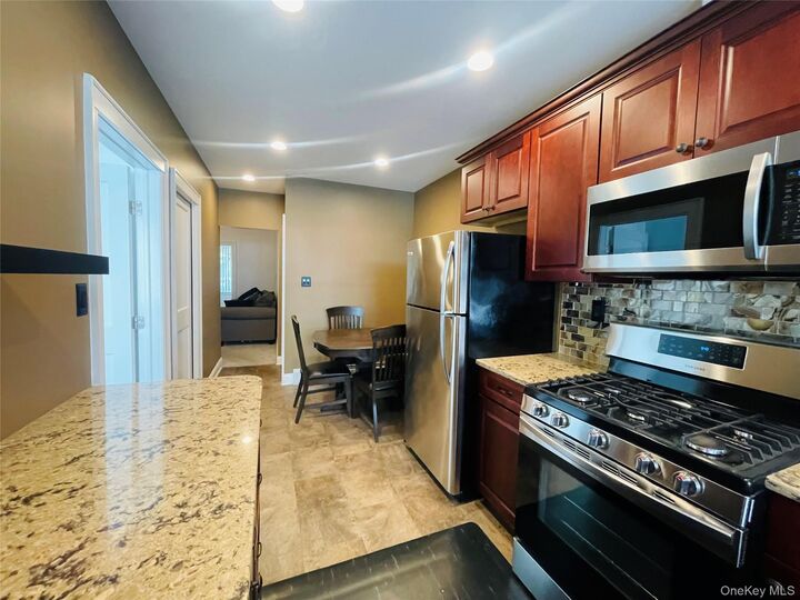 Property Photo:  47-32 39th Street  NY 11104 