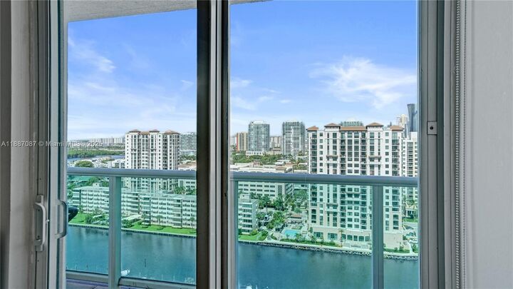 Property Photo:  100 Bayview Dr 1931  FL 33160 