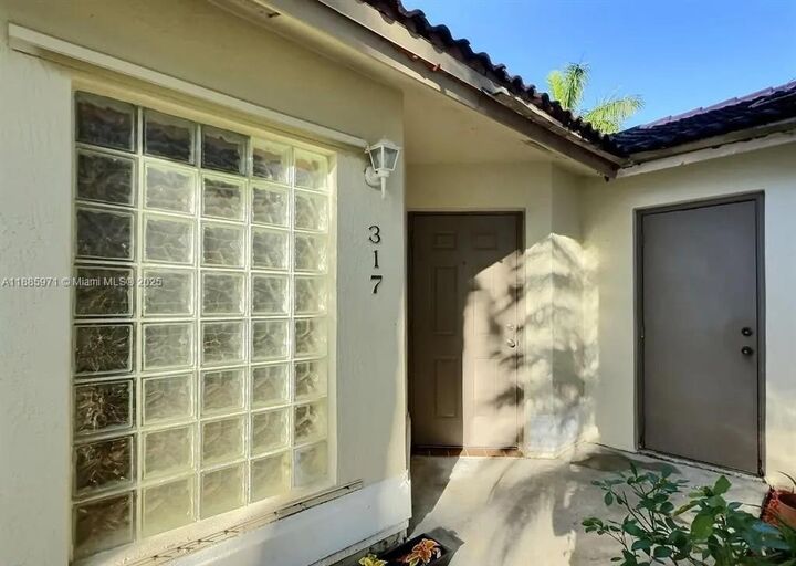 Property Photo: 317 NW 109th Ave FL 33026
