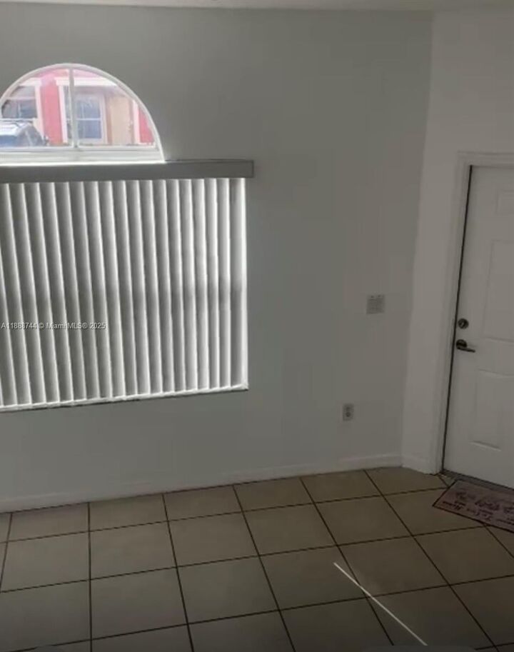 Property Photo:  6202 NW 116th Pl 444  FL 33178 