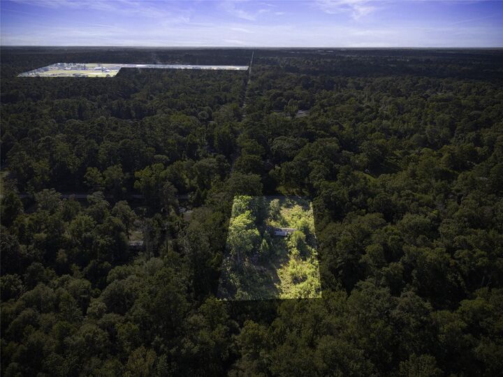 Property Photo:  245 County Road 3707  TX 77372 
