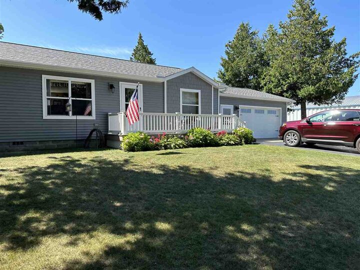 Property Photo:  451 Cadillac  MI 49701 