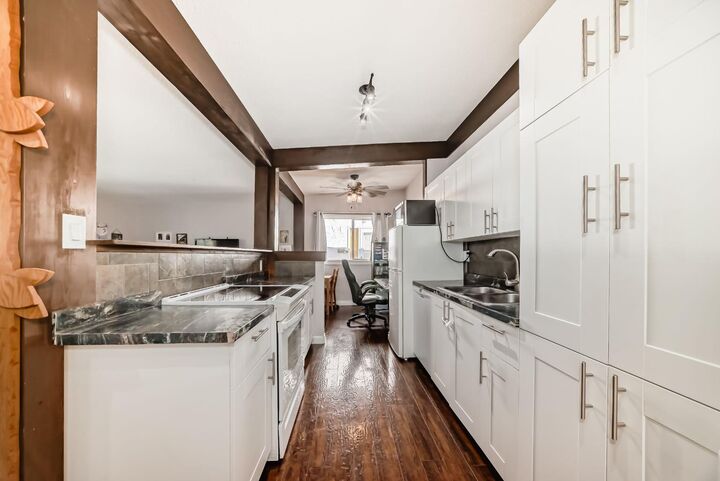 Property Photo: 724D Raynard Crescent SE AB T2A 1X7
