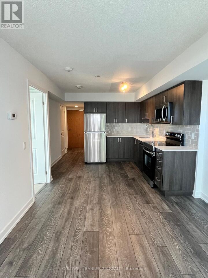 Property Photo: 1455 Celebration Drive 1007 ON L1W 1L8