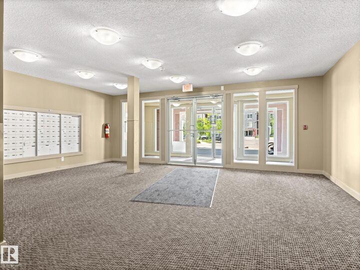 Property Photo: 3207 James Mowatt Trail SW 111 AB T6W 3L6