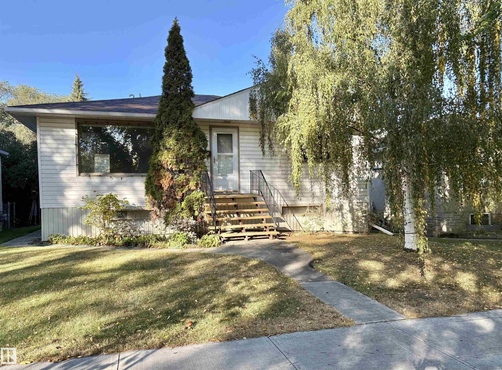 Property Photo: 12050 56 Street NW AB T5W 3T1