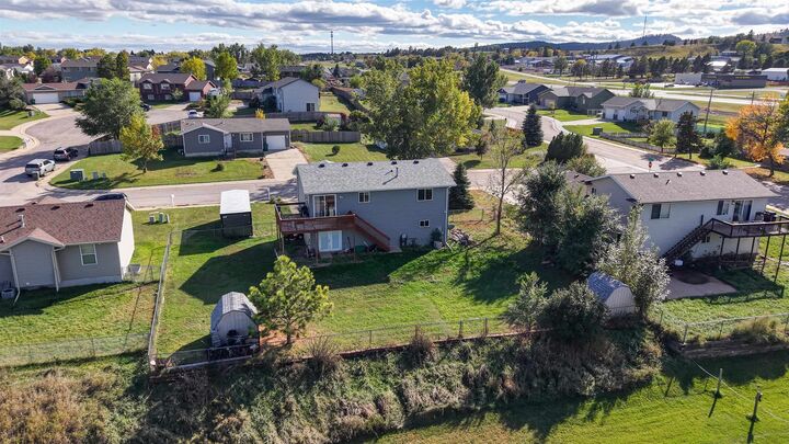 Property Photo: 5160 Orchid Lane SD 57718
