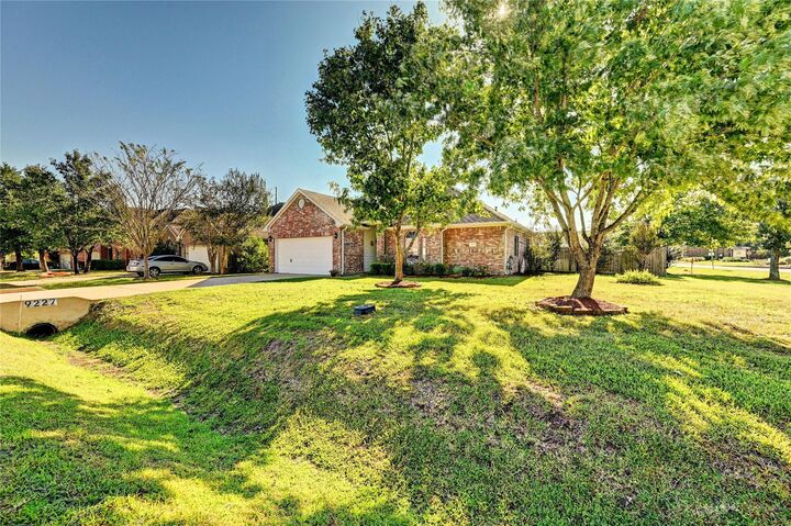 Property Photo: 9227 Hidden Lake E TX 77354