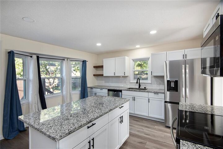 Property Photo:  7200 Sterling Avenue  MO 64133 