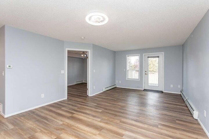 Property Photo: 56 Carroll Crescent 322 AB T4P 3Y3