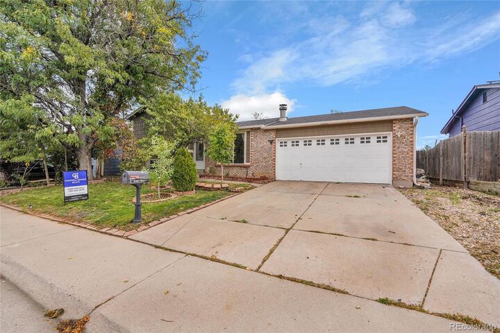 Property Photo: 1336 S Zeno Way CO 80017