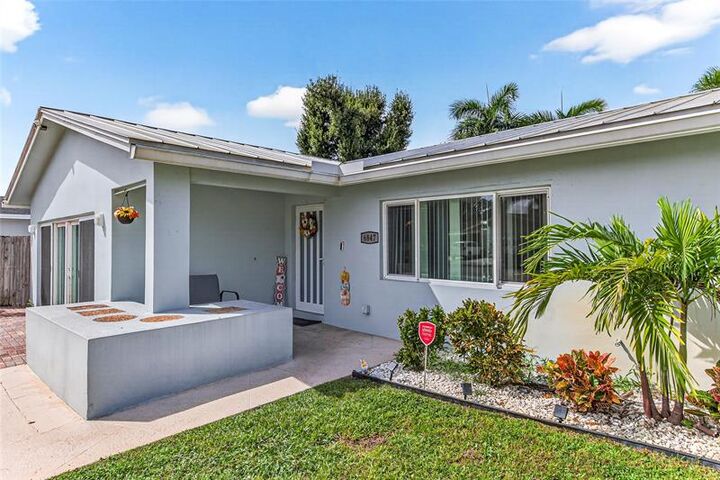 Property Photo: 6847 NW 27th Way FL 33309