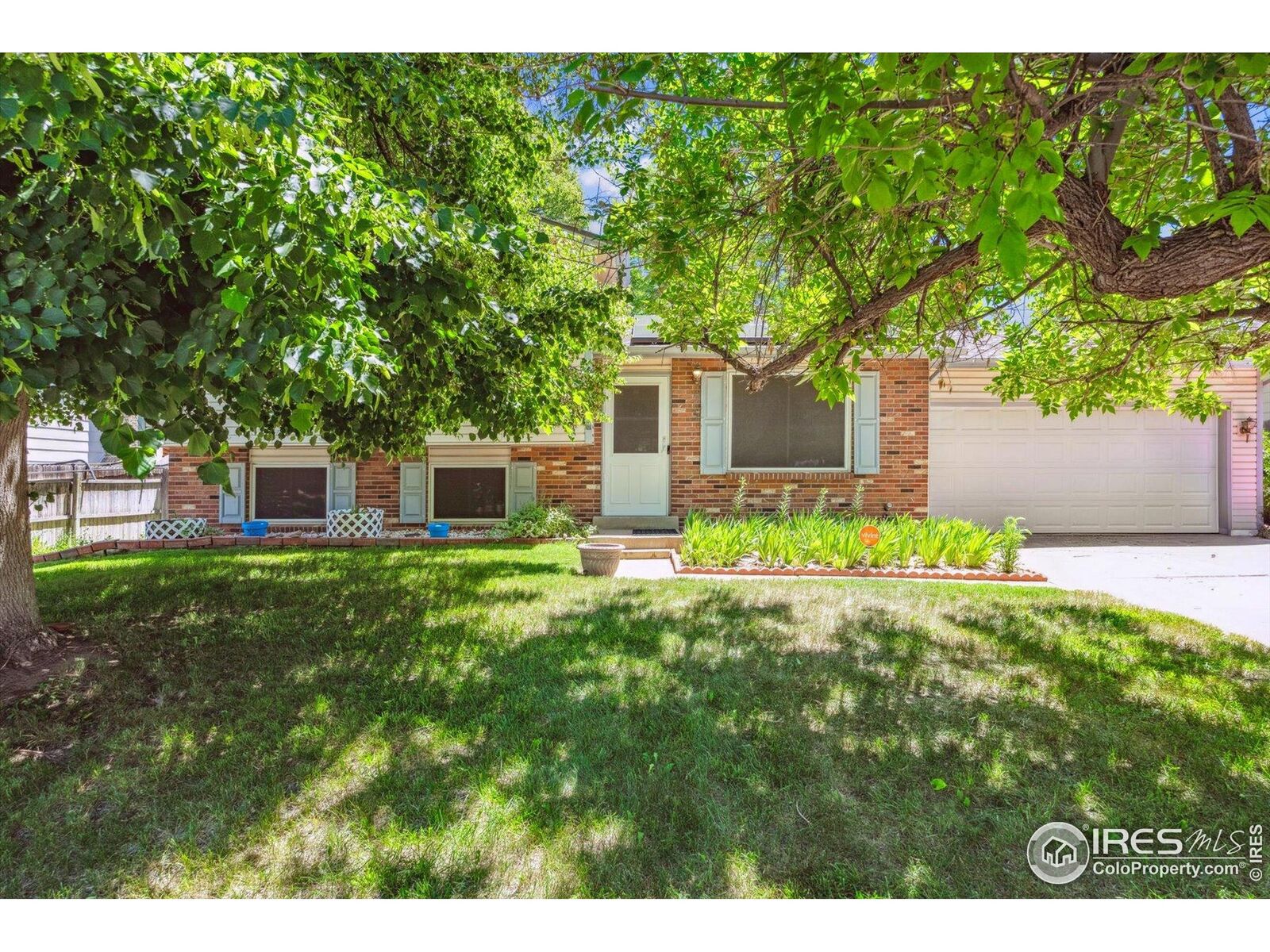 Property Photo:  2516 S Cimarron St  CO 80014 