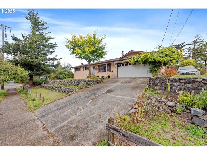 Property Photo:  610 Pacific Ave  OR 97420