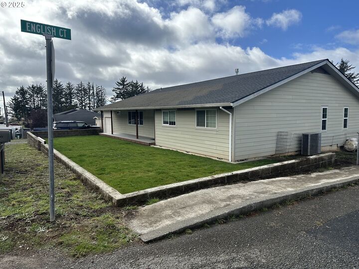 Property Photo:  711 1st St  OR 97415 