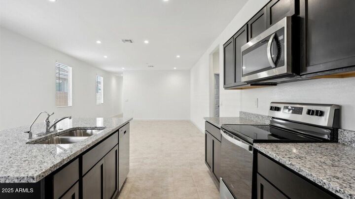 Property Photo:  1749 W Stealth Avenue  AZ 85120