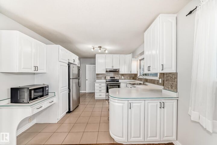 Property Photo: 12920 93 Street NW AB T5E 3T2