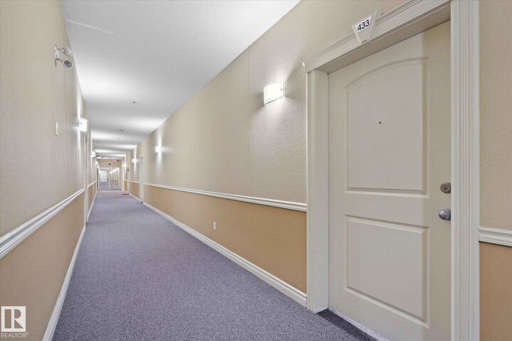 Property Photo: 50 Woodsmere AB T8L 4N9