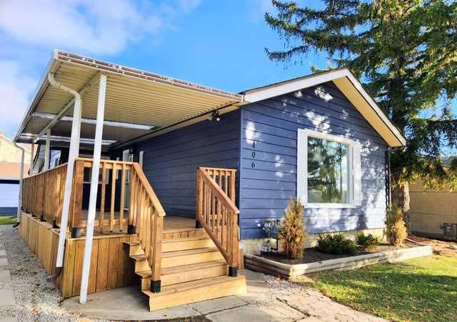 Property Photo:  406 8 Avenue SE  AB T1V 1J3