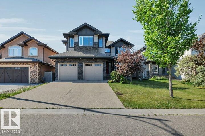 Property Photo: 1211 Adamson Drive SW AB T6W 0V5
